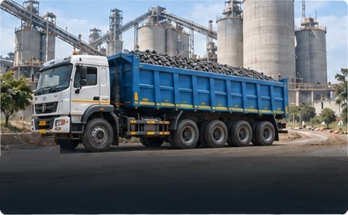 Heavy tipper carrying clinker near a cement plant