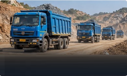 Fleet of tipper trucks transporting aggregate from a quarry